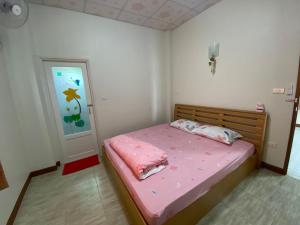 Postel nebo postele na pokoji v ubytování เพียงภูโฮมสเตย์ + 5 fotografií