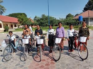 a group of people standing with their bikes at Kakrona Pouk Homestay in Siem Reap +103 photos