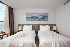 Postel nebo postele na pokoji v ubytování Gosia Hotel