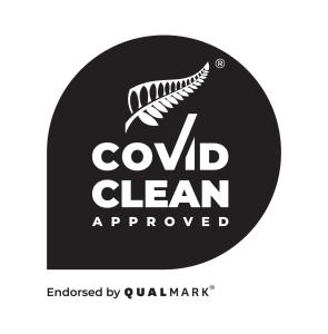 a logo for a cove clean approved agency at St Leonards Vineyard Cottages in Blenheim