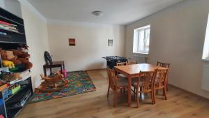 a dining room with a table and chairs at Chata Na Čiháku in Klášterec nad Orlicí