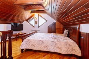 Un pat sau paturi într-o cameră la Ole Apartment - LuXury Residence