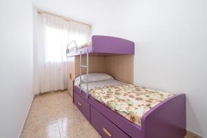 Posteľ alebo postele v izbe v ubytovaní Villa Manoli