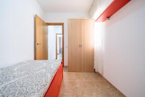 Posteľ alebo postele v izbe v ubytovaní Villa Manoli