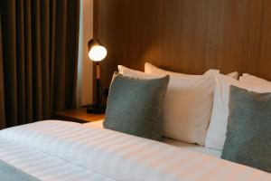 Postel nebo postele na pokoji v ubytování El Sancho Hotel