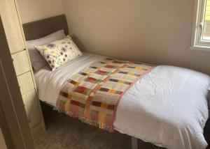 Krevet ili kreveti u jedinici u objektu Ladera Retreat Lodges