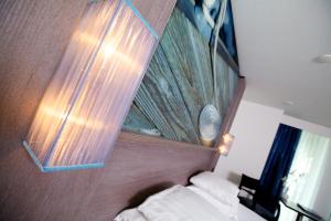 Letto o letti in una camera di Hotel Medemblik