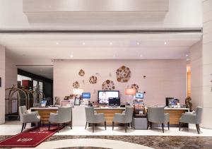 TV a/nebo společenská místnost v ubytování Kunshan Yu Yuan Garden Hotel