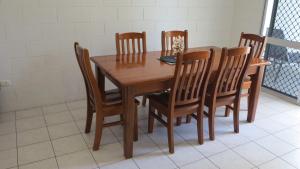 a wooden dining room table and chairs in a room at Arcadia Beach Unit 4 in Arcadia