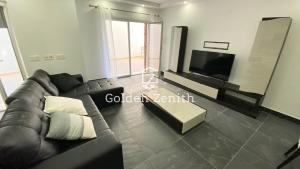 Zona de estar de Zambujeira do Mar spacious two-bedroom apartment by Golden Zenith