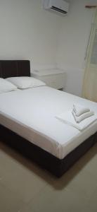 A bed or beds in a room at Best summer vacation