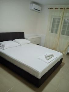 A bed or beds in a room at Best summer vacation