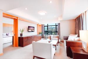 Kuchyň nebo kuchyňský kout v ubytování Kunshan Yu Yuan Garden Hotel