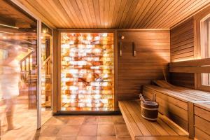 a sauna with a trash can in a room at Tides Boutique Hotel in Norden +107 photos