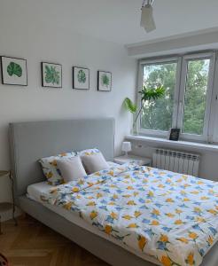 Voodi või voodid majutusasutuse Comfortable and cosy apartment 3 beds-city center toas