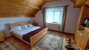Postel nebo postele na pokoji v ubytování Casa Darius