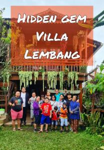 a group of children standing in front of a building at Oemah Kajoe Lembang in Lembang