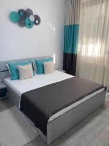 Ліжко або ліжка в номері Apartament Stefan Mamaia Nord