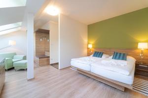 Posteľ alebo postele v izbe v ubytovaní Hotel Vyhlídka