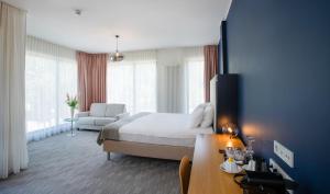 Voodi või voodid majutusasutuse Wasa Resort Hotel, Apartments & SPA toas