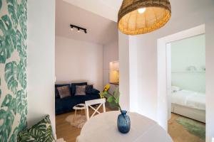 Posteľ alebo postele v izbe v ubytovaní Green Leaf Apartment