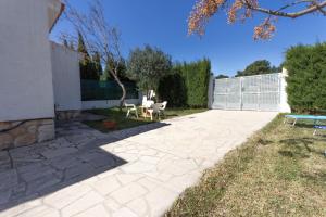 Zahrada ubytování INNOUTHOME Casa Familiar con Piscina y Jardín Av 3 Calas