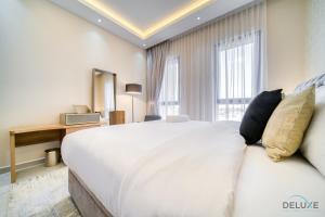 Extravagant 1BR At Madinat Jumeirah Living Rahaal 2 by Deluxe Holiday Homes 객실 침대