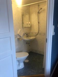 Kúpeľňa v ubytovaní Norneshuset Overnatting
