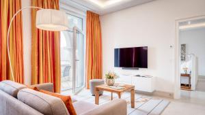 TV a/nebo společenská místnost v ubytování Park Hotel Vitznau