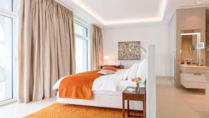 Cama ou camas em um quarto em Park Hotel Vitznau