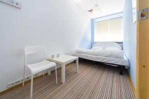Cama o camas de una habitación en Traveler's haven