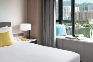 Voodi või voodid majutusasutuse Royal Park Hotel toas