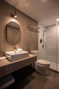 Koupelna v ubytování Monocolo Boutique Hotel