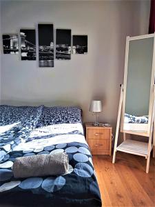 Posteľ alebo postele v izbe v ubytovaní Aurora Apartments