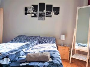 Posteľ alebo postele v izbe v ubytovaní Aurora Apartments