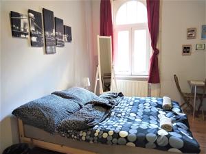 Posteľ alebo postele v izbe v ubytovaní Aurora Apartments