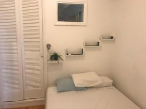 Krevet ili kreveti u jedinici u okviru objekta Small flat in the heart of Lisbon