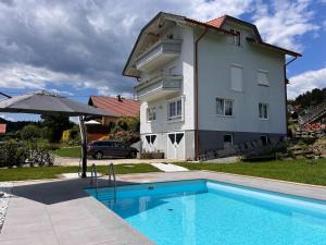 The swimming pool at or close to Apartment Frank-1 by Interhome