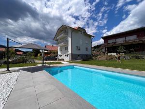 The swimming pool at or close to Apartment Frank-1 by Interhome