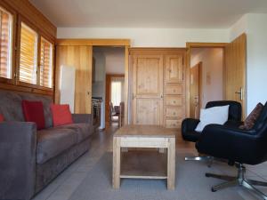 Posezení v ubytování Apartment Les Chouettes 1 by Interhome + 31 fotografií