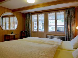 Postel nebo postele na pokoji v ubytování Apartment Grosshorn by Interhome