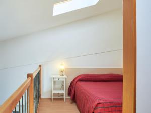 A bed or beds in a room at Holiday Home Gelsomino-1 by Interhome