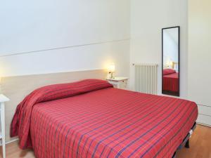 A bed or beds in a room at Holiday Home Gelsomino-1 by Interhome