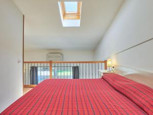 A bed or beds in a room at Holiday Home Gelsomino-1 by Interhome