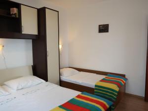 Posteľ alebo postele v izbe v ubytovaní Apartment Jure by Interhome