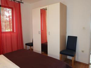 Posteľ alebo postele v izbe v ubytovaní Apartment Jure by Interhome