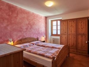 A bed or beds in a room at Holiday Home Antonia by Interhome