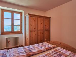 A bed or beds in a room at Holiday Home Antonia by Interhome