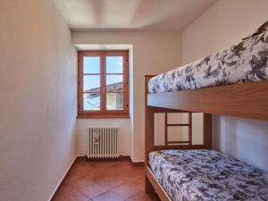 A bed or beds in a room at Holiday Home Antonia by Interhome