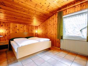 Posteľ alebo postele v izbe v ubytovaní Apartment Cincelli - Catinaccio by Interhome